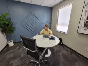 Small business owner working in a shared meeting space